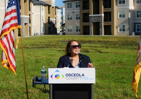 Cameron Preserve Phase 2 Ribbon Cutting ceremony - Commissioner Viviana Janer speaks at the ribbon cutting and celebration of the opening of 84 affordable rental units -- bringing the total at Cameron Preserve to 185..