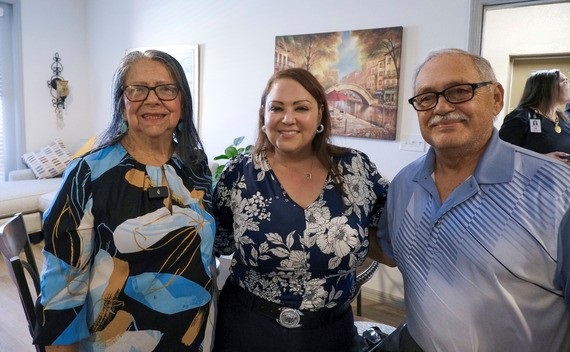 Cameron Preserve Phase 2 Ribbon Cutting ceremony - Commissioner Viviana Janer tours the apartment that Aura and Hernan Perez now call home.