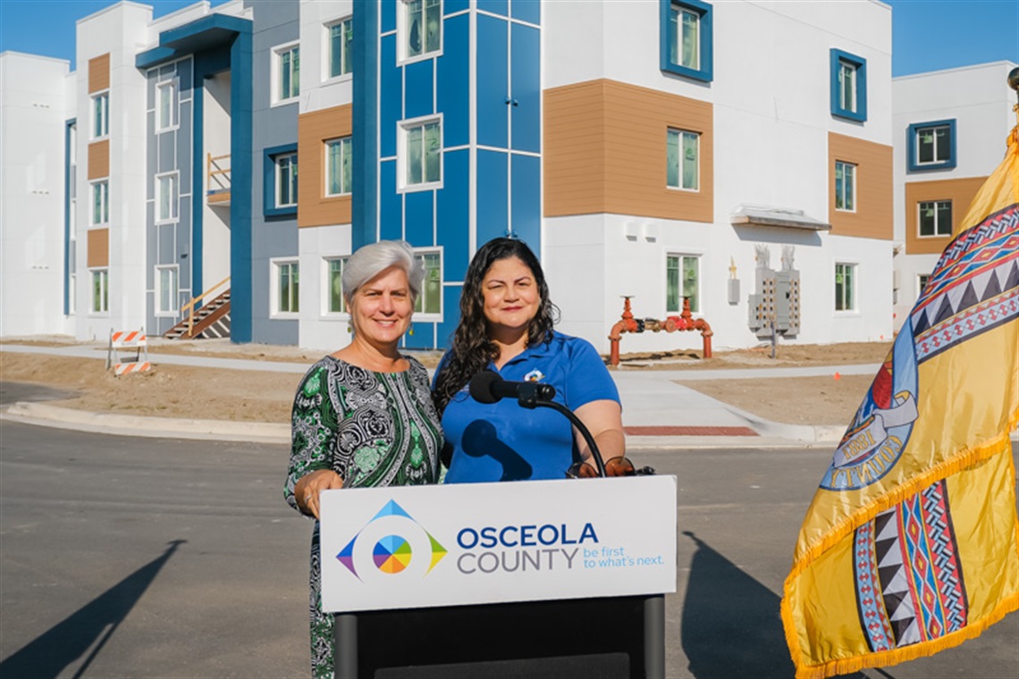 Chairwoman Cheryl Griebs and Vice Chair Peggy Choudhry celebrates the preleasing event at Falcoln Trace II.