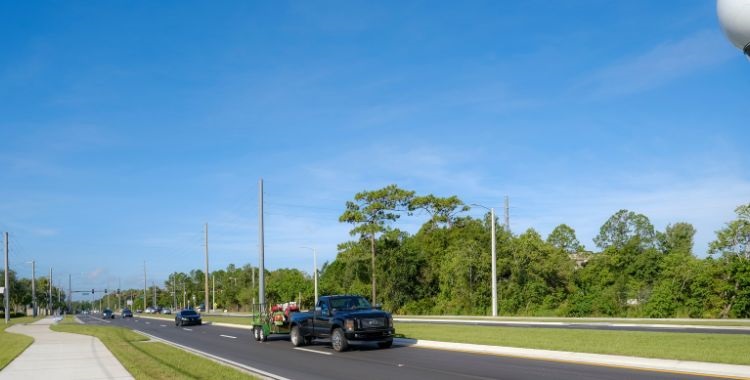 Traffic flows on the new section of Simpson Road Wednesday morning. 